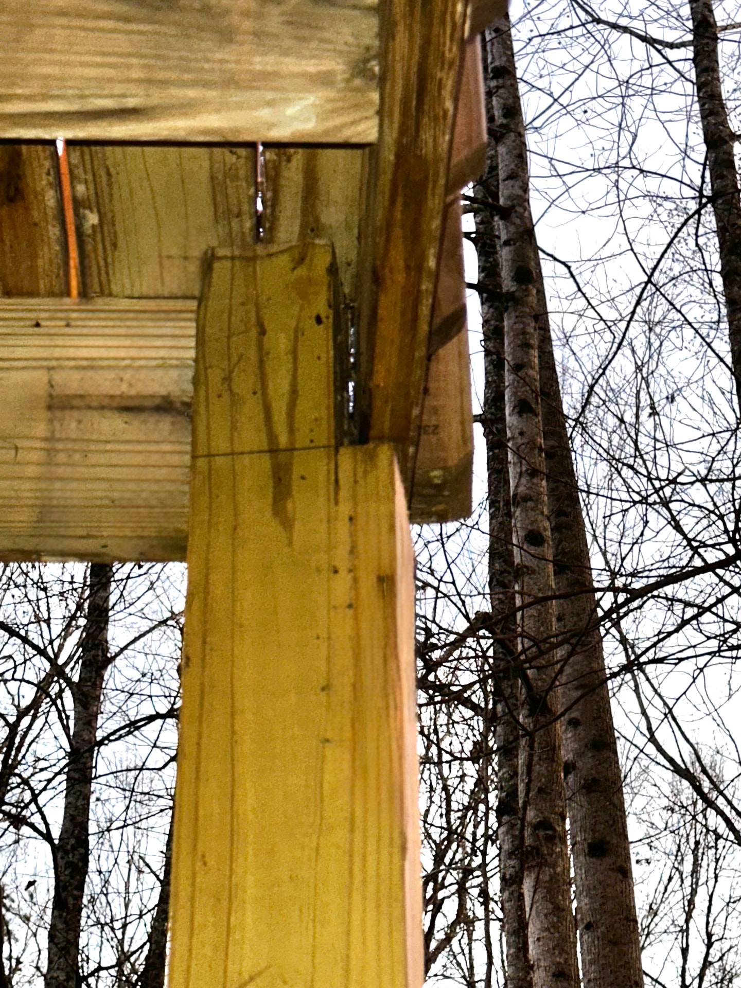 Wooden deck support post that has shifted away from the frame, the kind of hidden issue ParentManager watches for